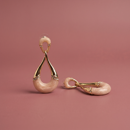 Blush pink marbled enamel teardrop dangle earrings with gold-plated metal and clear crystal accents