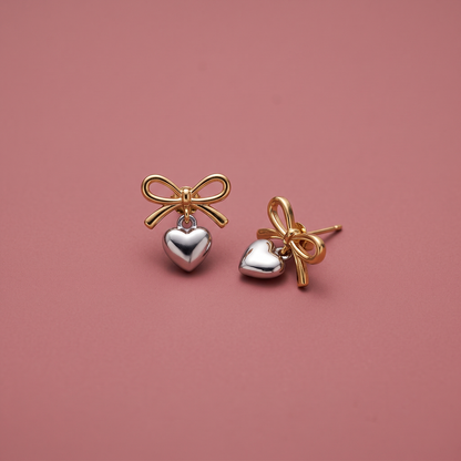 Gold and silver bow heart drop earrings in stainless steel with gold-plated finish