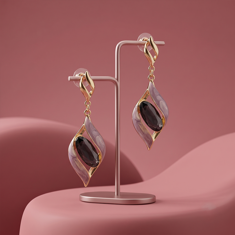 Two-section articulated drop earrings showing the connected, moving design