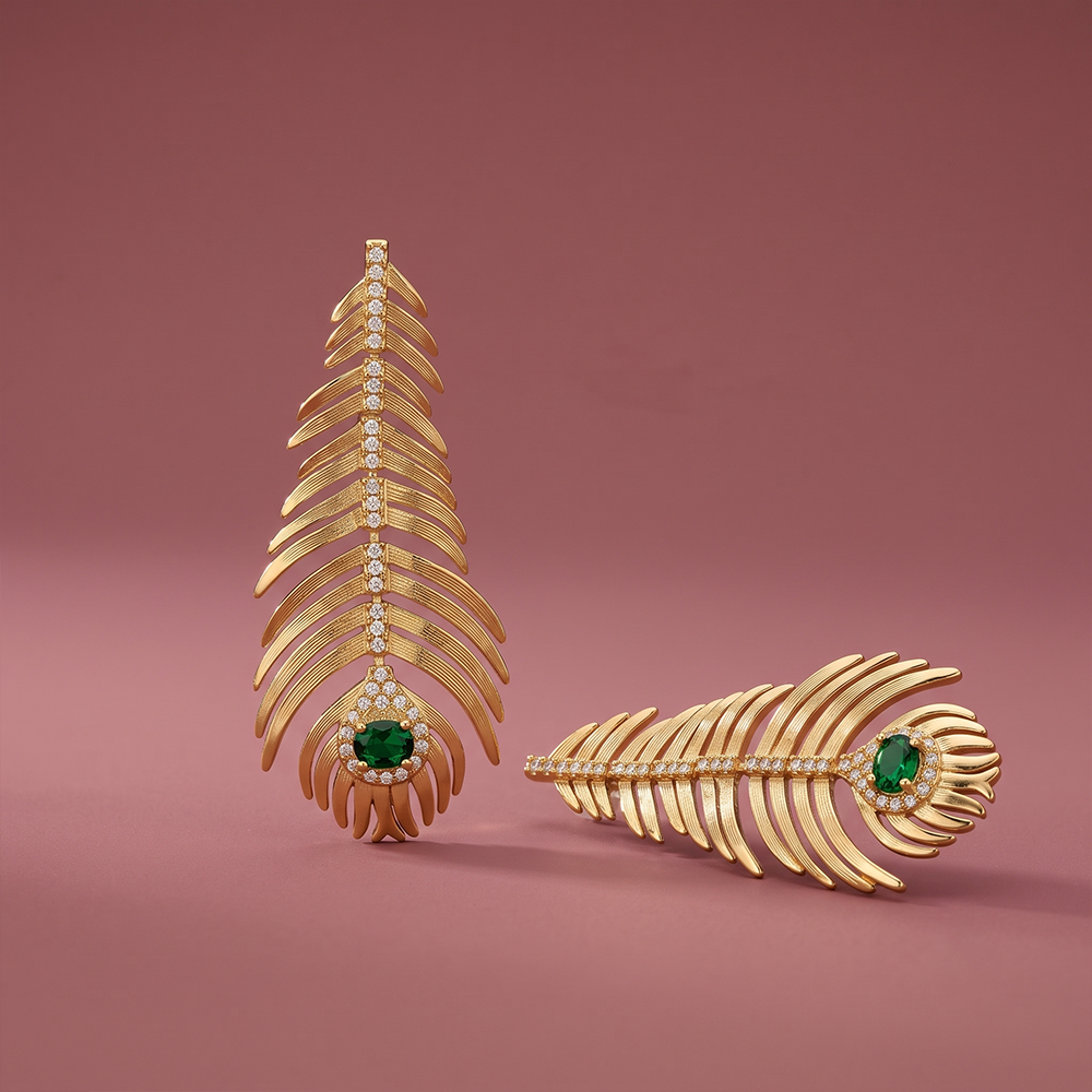 Emerald green and gold plated feather drop earrings with pavé crystal accents, 7cm statement design