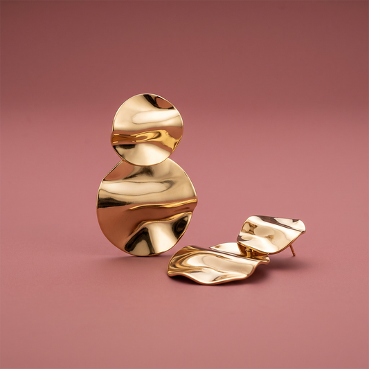 Gold plated two-tier abstract disc drop earrings with wavy polished finish