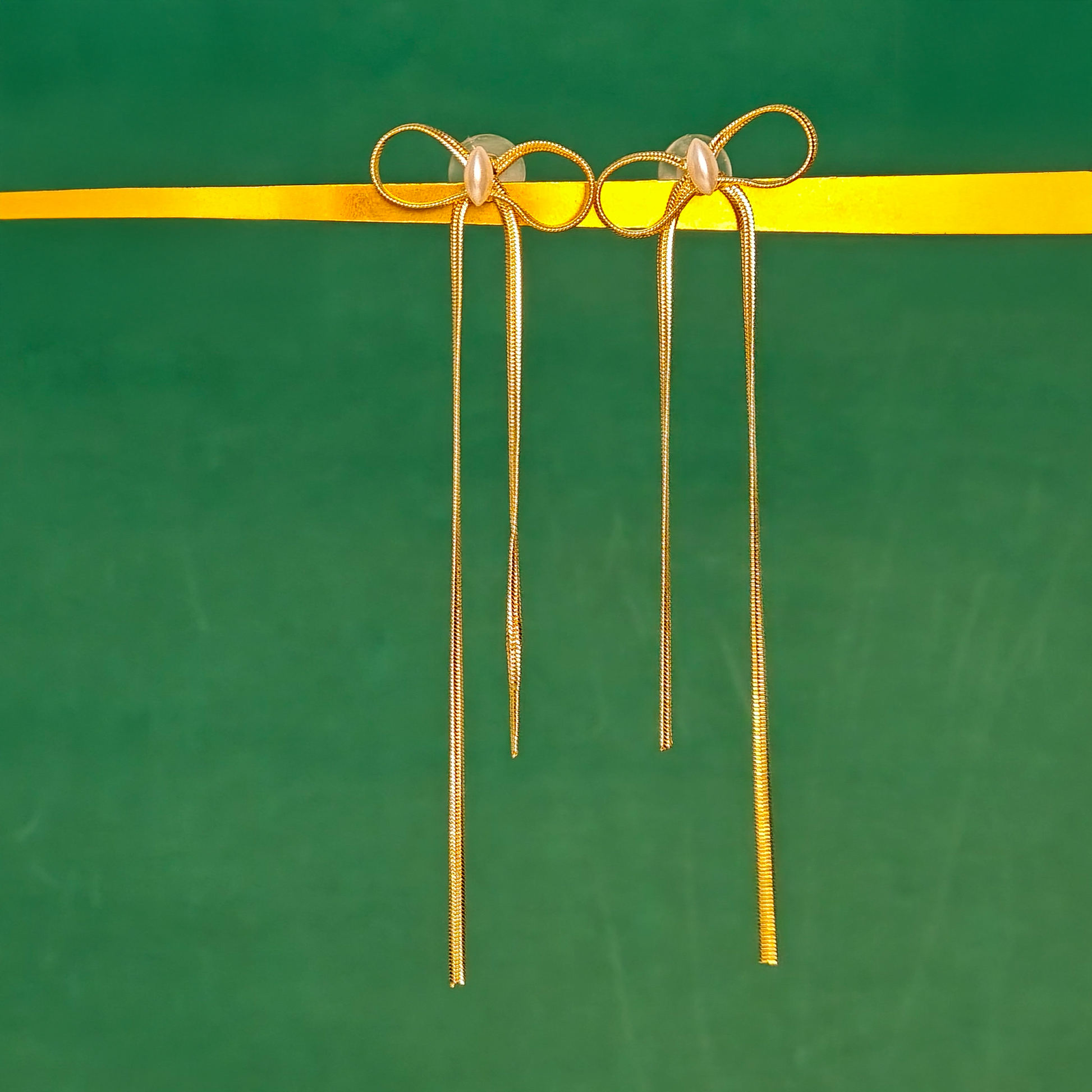 Elegant Pearl Bow Long Drop Earrings – Gold Plated | Gaurangi