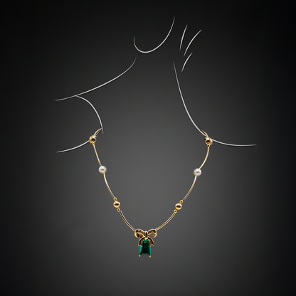 Emerald Green Pendant and Pearl Accents – Bow Design